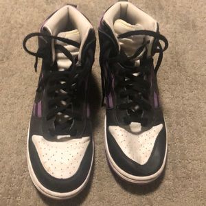Purple and black Nike sneakers